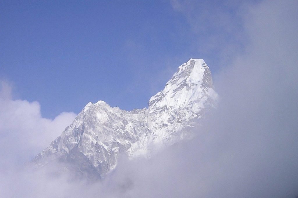 Panoramic view of the Himalayas with snow-capped peaks during an Everest luxury trek.
