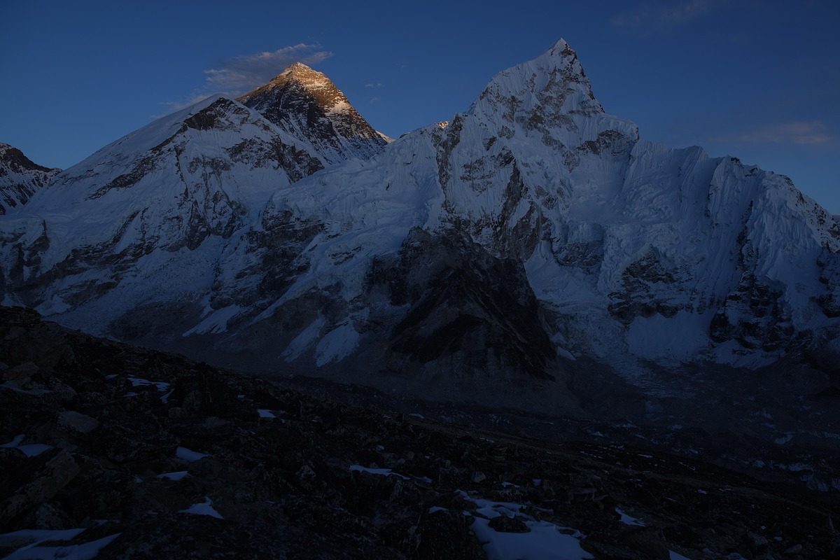 Golden sunset over the Himalayas during Everest Luxury Trek – ideal for drone photography and content creators.
